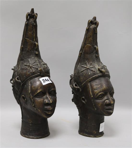A pair of Benin bronze heads height 36cm